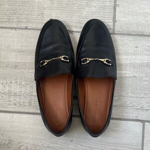 Coach Black Leather Slip-On Loafers with Gold Accents